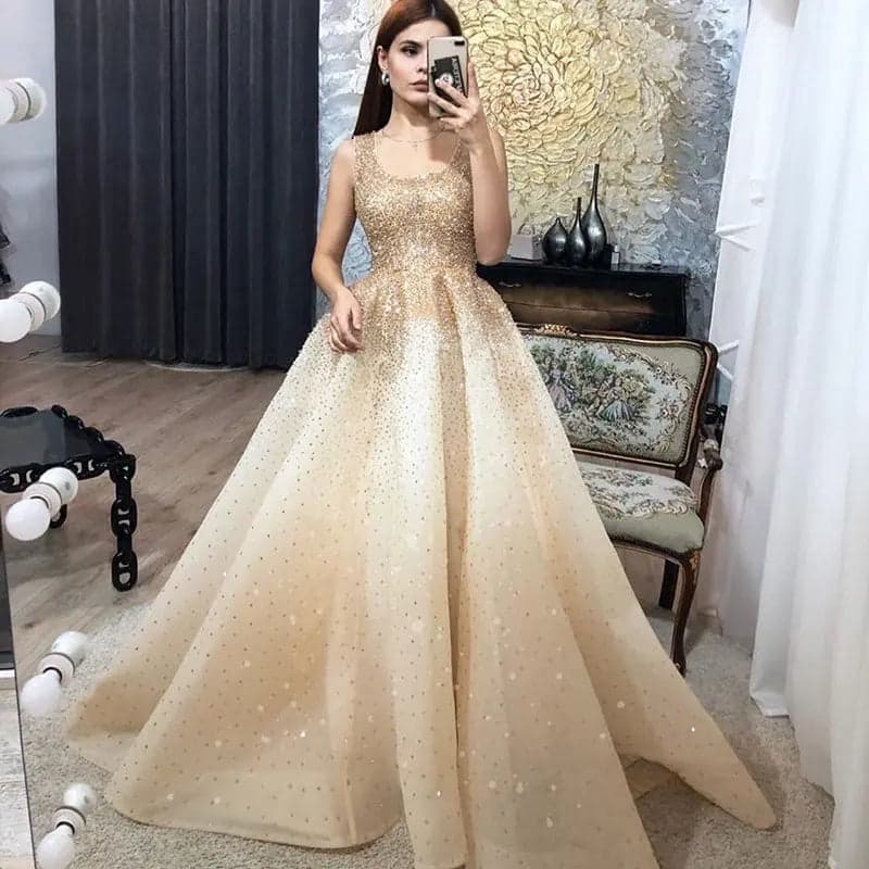 فستان سهرة ذهبي مزين بالخرز الكريستالي SS208